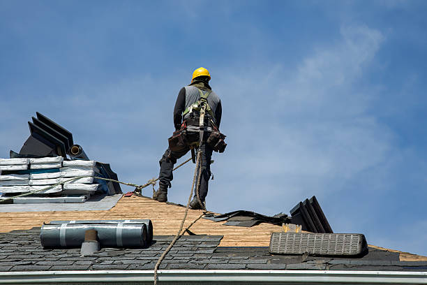 Professional Gutter Installation technician working in Wheelwright, MA